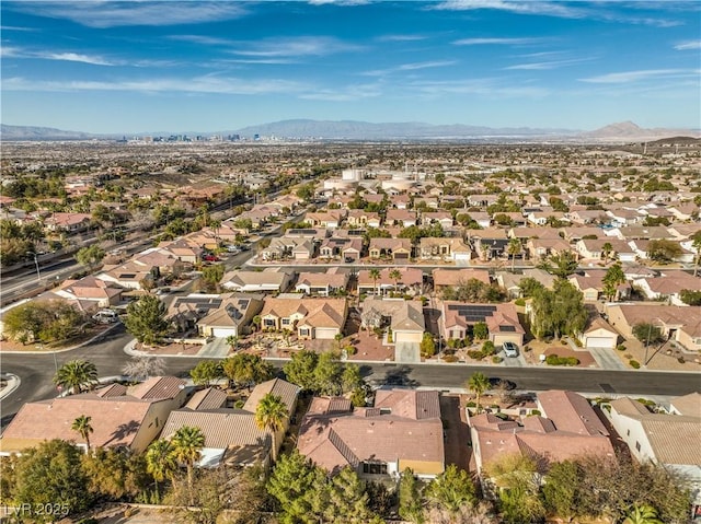 birds eye view of property with a residential view and a mountain view