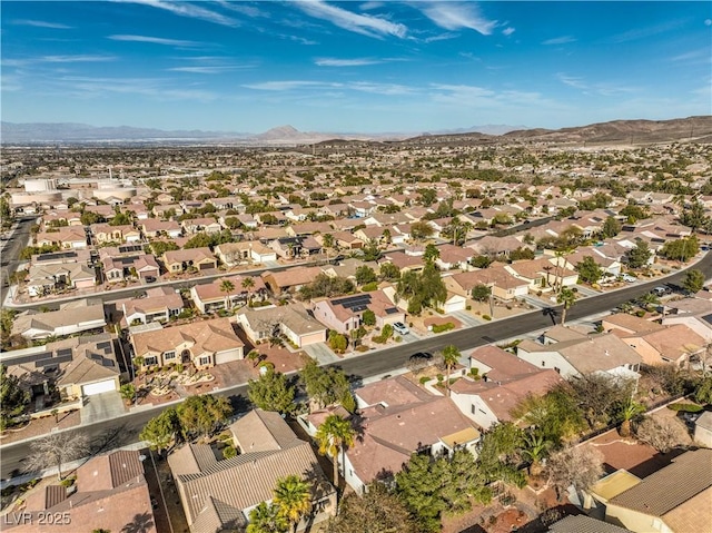 drone / aerial view with a mountain view and a residential view