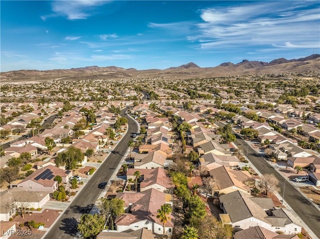 drone / aerial view with a residential view and a mountain view