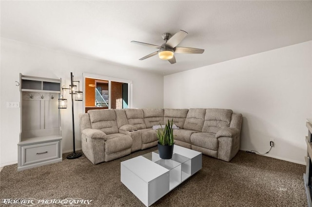 living room with dark carpet and ceiling fan