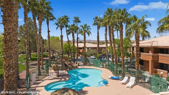 view of swimming pool featuring a patio