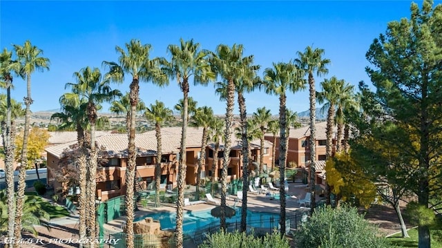 view of property featuring a community pool