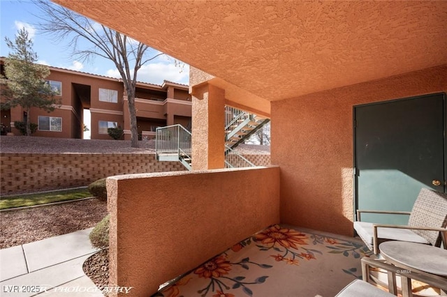 view of patio / terrace featuring a balcony