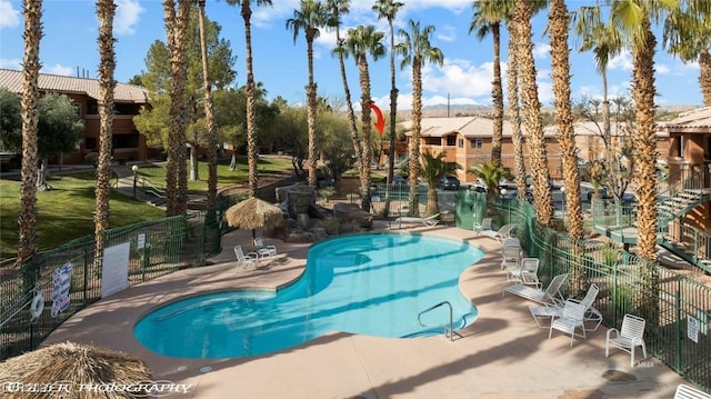 view of swimming pool featuring a patio area