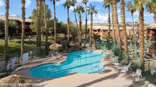 view of swimming pool with a patio