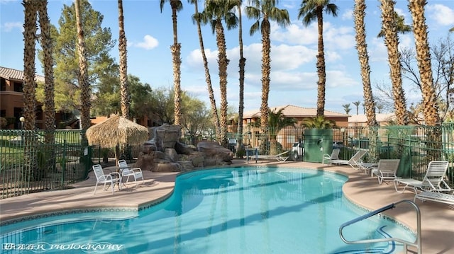 view of swimming pool with a patio area