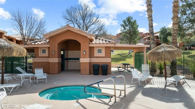 rear view of property with a patio area