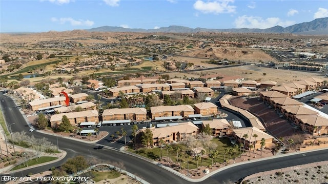 birds eye view of property featuring a mountain view