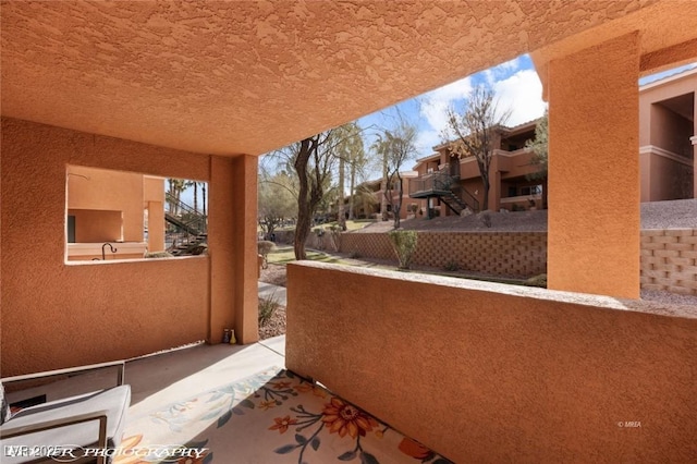 view of patio / terrace featuring a balcony