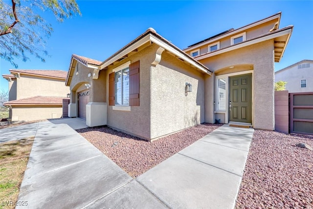 view of front of home featuring a garage