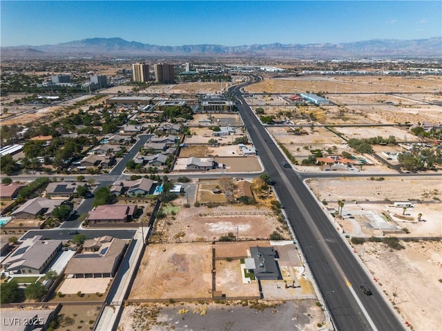 drone / aerial view featuring a mountain view