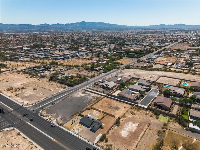 drone / aerial view featuring a mountain view