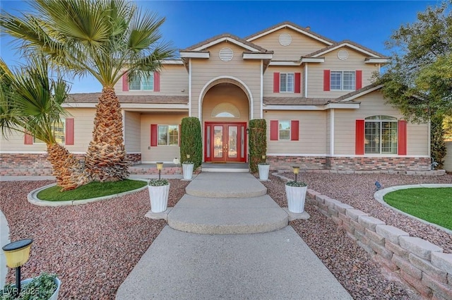 traditional home featuring french doors