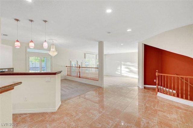 interior space featuring baseboards, visible vents, light colored carpet, and recessed lighting