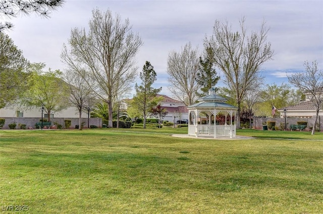 view of home's community with a gazebo and a lawn