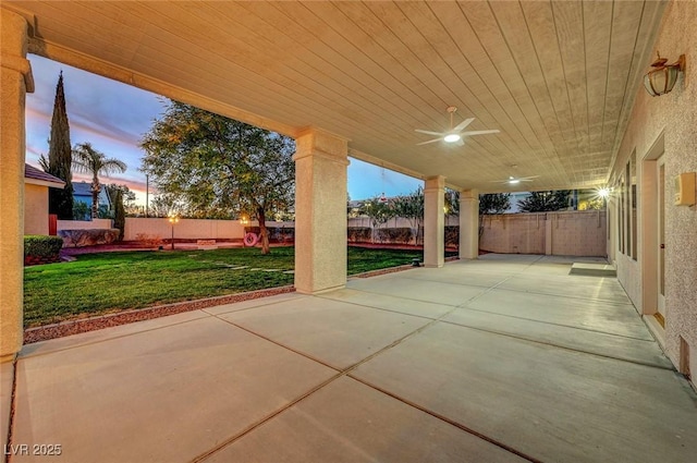 view of patio featuring ceiling fan and a fenced backyard