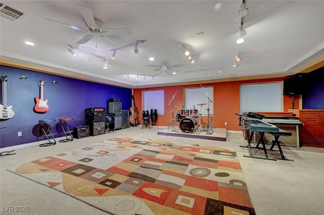 game room featuring a ceiling fan and visible vents