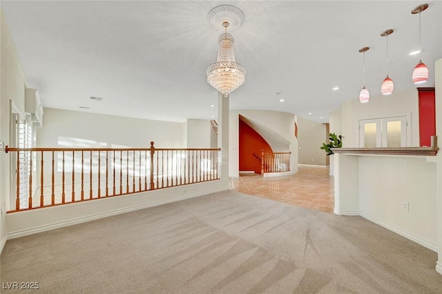 unfurnished room with light carpet, baseboards, a chandelier, and recessed lighting