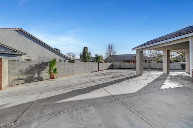 view of patio with fence