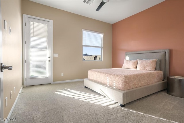 bedroom with light carpet and ceiling fan