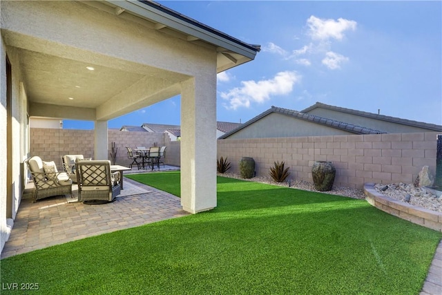 view of yard with a patio area