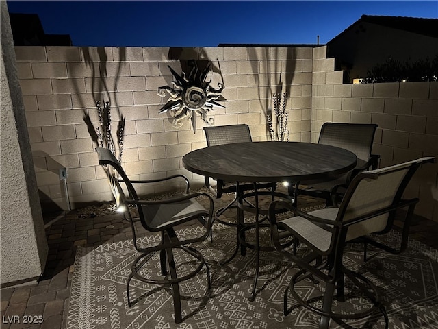 view of patio at night