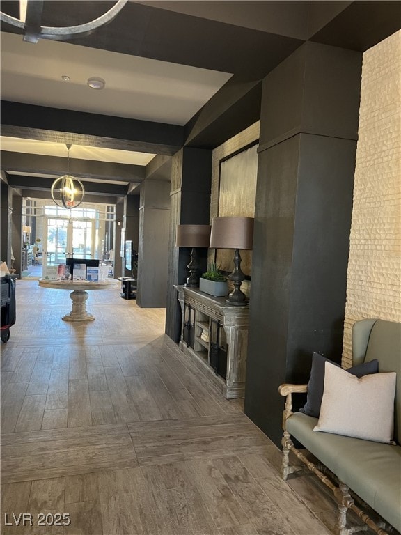 hallway with beamed ceiling and wood-type flooring