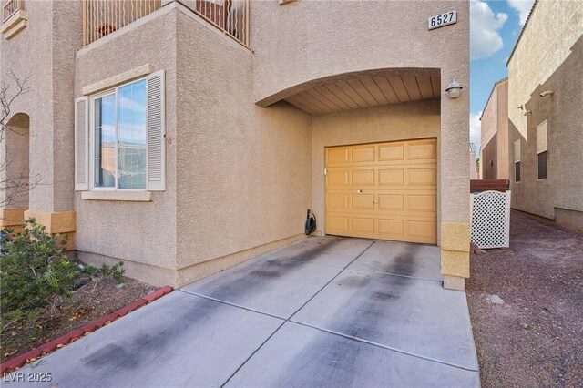 6527 Netherseal Ave, Las Vegas, NV 89139 - view of home's exterior with a garage