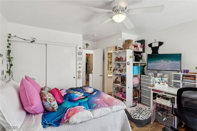 6527 Netherseal Ave, Las Vegas, NV 89139 - bedroom featuring ceiling fan, wood-type flooring, and a closet