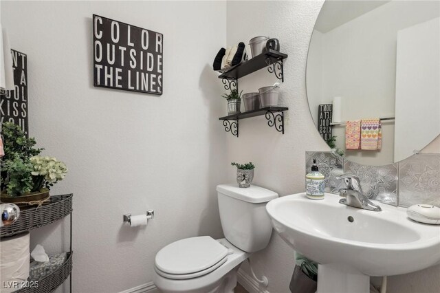 6527 Netherseal Ave, Las Vegas, NV 89139 - bathroom featuring sink and toilet
