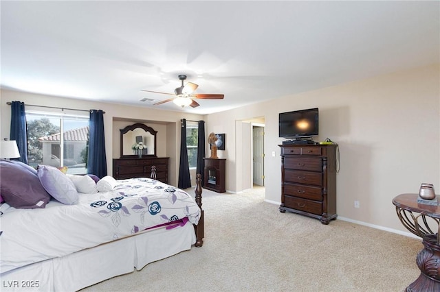 carpeted bedroom featuring ceiling fan