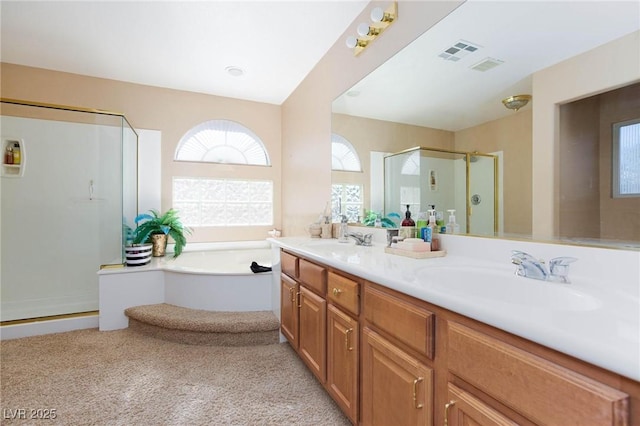 bathroom featuring vanity and separate shower and tub