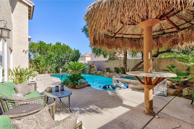 view of pool featuring a patio area