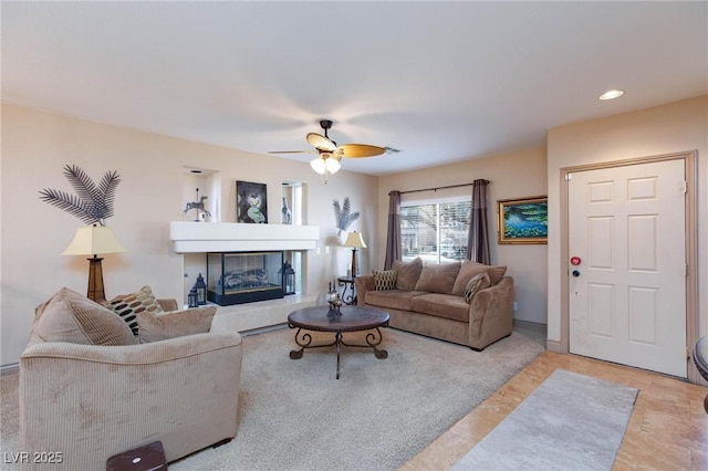 living room featuring ceiling fan