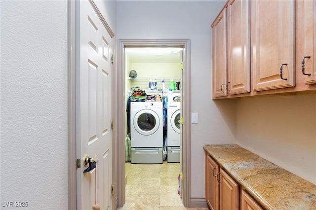 laundry room with washing machine and clothes dryer