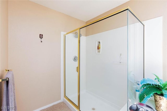 bathroom featuring an enclosed shower