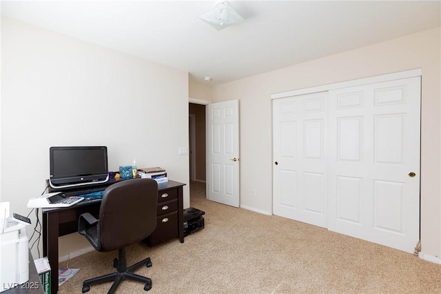 home office with light colored carpet