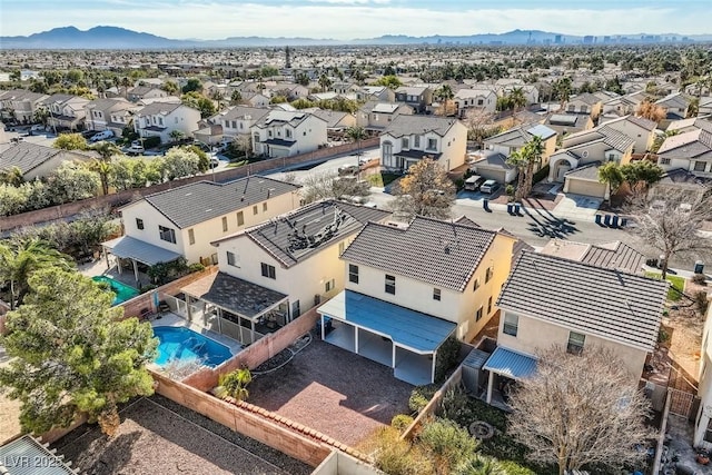 drone / aerial view featuring a mountain view