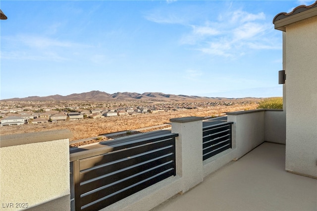 balcony featuring a mountain view