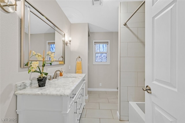 bathroom with vanity, tile patterned flooring, and tub / shower combination