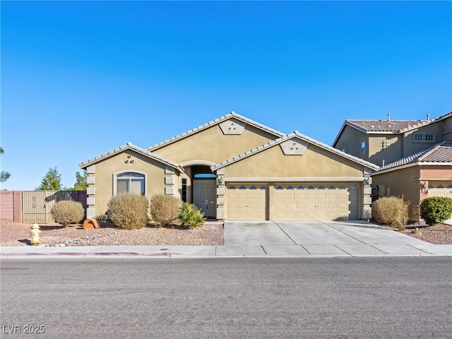 view of front of property featuring a garage