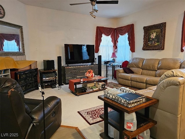 living room with carpet floors and ceiling fan