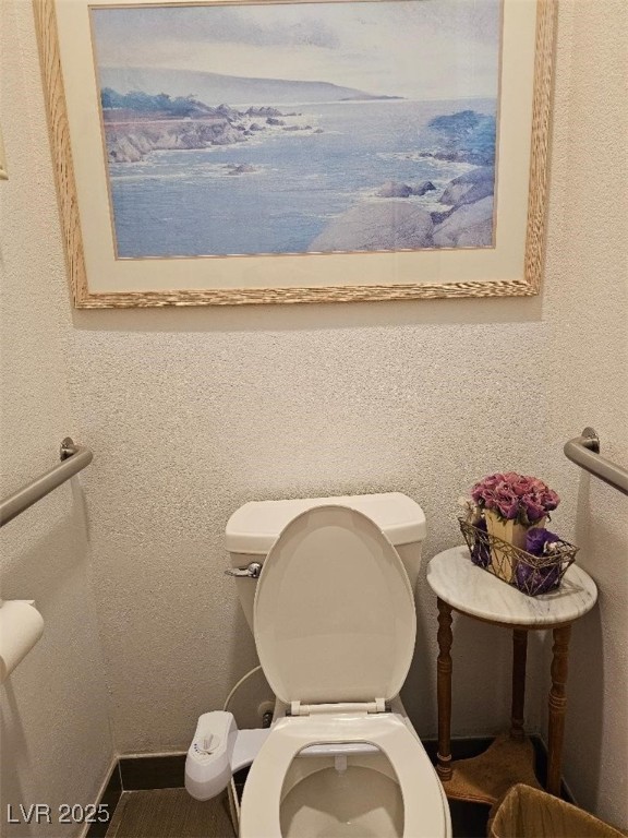 bathroom featuring toilet