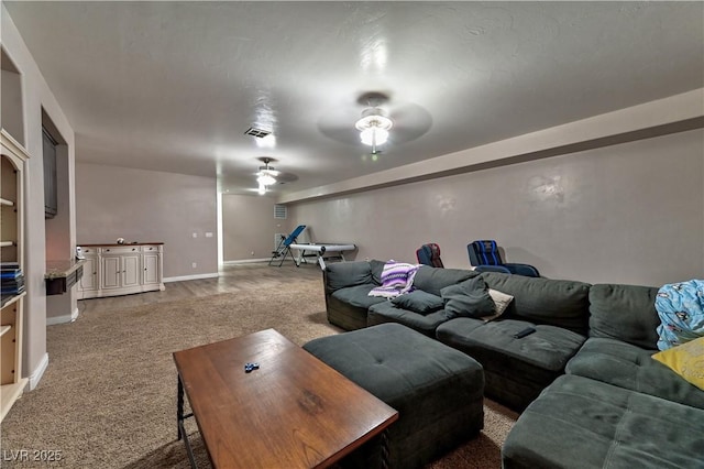 living room with ceiling fan and light carpet