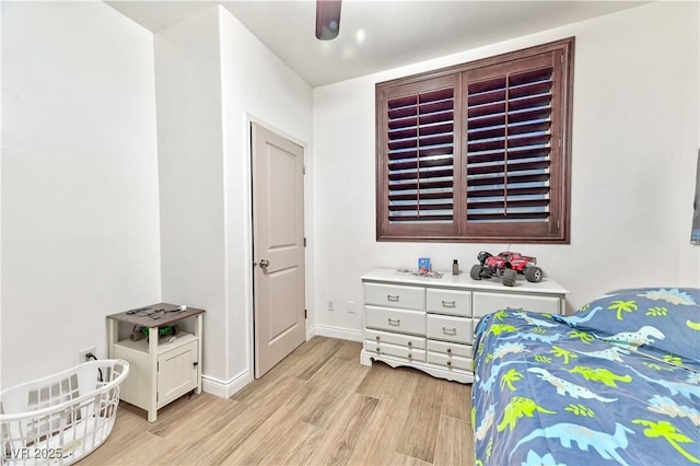 bedroom with light wood-type flooring