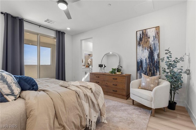 bedroom featuring light hardwood / wood-style flooring, ceiling fan, and access to outside