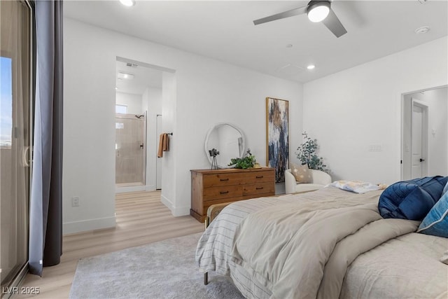 bedroom featuring ceiling fan, connected bathroom, and light hardwood / wood-style floors