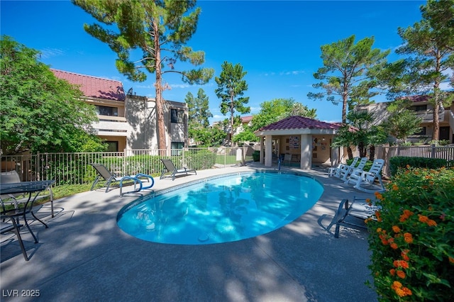 view of swimming pool featuring a gazebo and a patio area