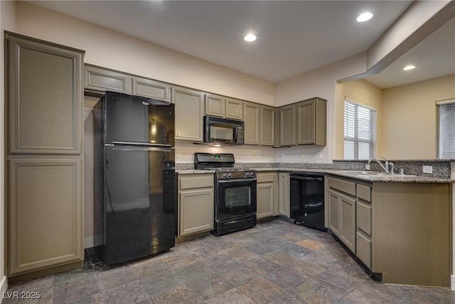 kitchen featuring sink, gray cabinets, black appliances, and light stone countertops