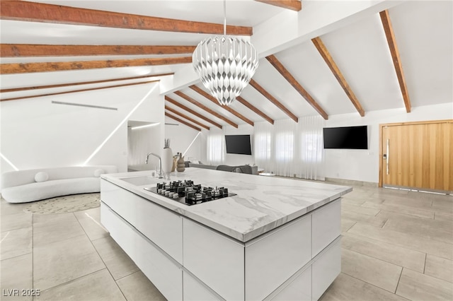 kitchen featuring white cabinetry, lofted ceiling with beams, hanging light fixtures, and a notable chandelier